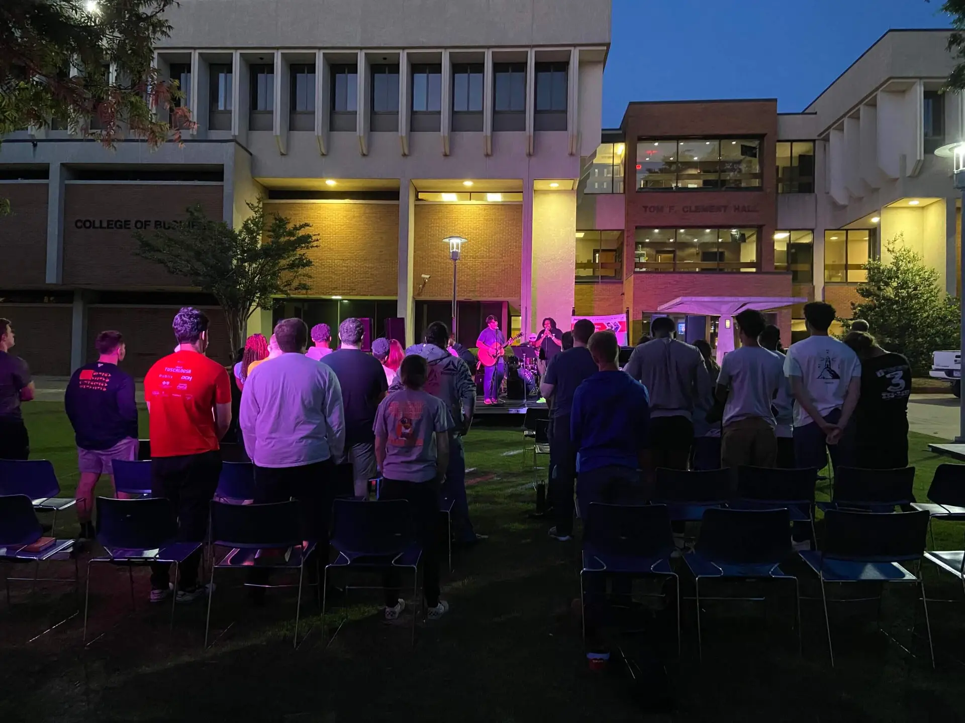 College students gather for worship on campus quad at Auburn University Montgomery