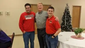 Gary Brittain (center), BCM campus minister at Jacksonville State University, with two male JSU students