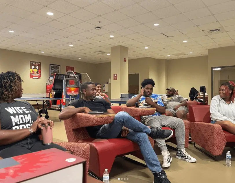 Tuskegee University BCM students sit together in chairs in Student Union